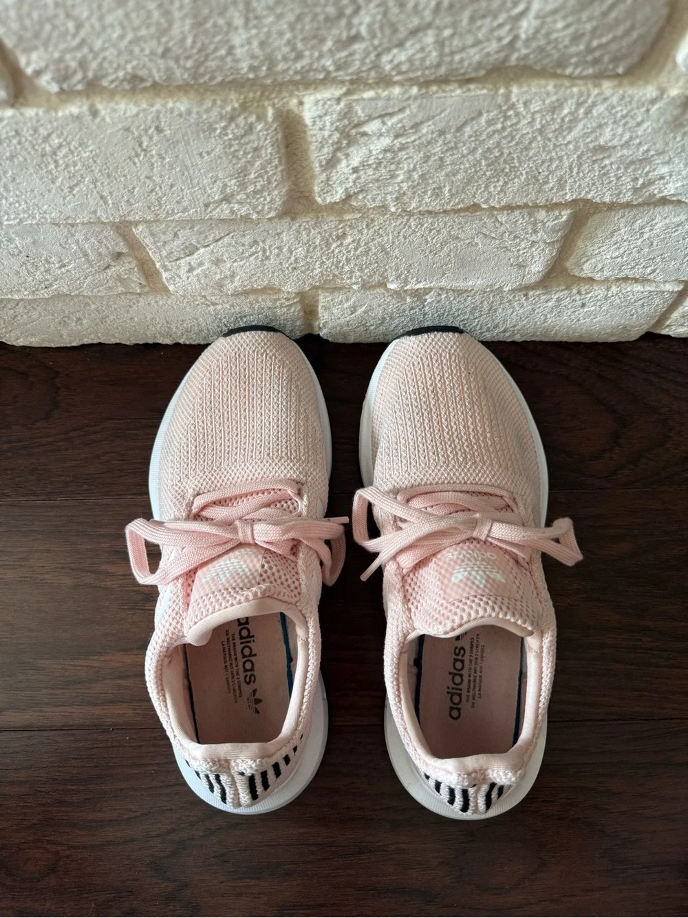 Adidas Swift Run Sneaker in Light Pink